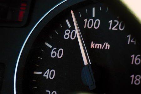 Photo speedometer in the car on the dashboard. Car dashboard.