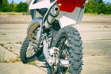 Motocross bike Enduro in the Parking lot. Rear viewの写真素材