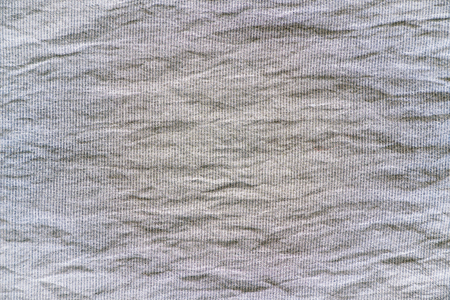 Texture of gray crumpled fabric for background and design.