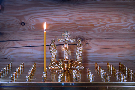 The altar with a candle for the repose in the Orthodox Church. Ð¡andle for the rest of the soulの写真素材