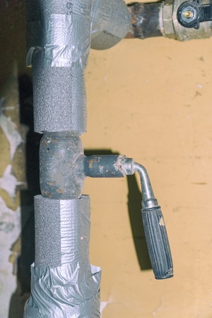 Adjustable gate tap valve on home heating system