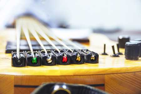 Modern Electric six-string bass guitar. Selective focusの写真素材