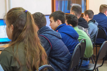 Chapaevsk, Samara region, Russia - April 17, 2019: College in Chapaevsk city. Students in a computer class. Students in front of computers in a computer classのeditorial素材