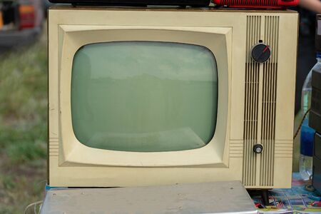 An old-fashioned analog TV in gray with a kinescope.Retro electronicsの写真素材