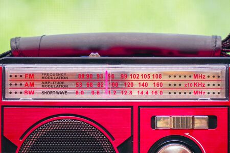 Old radio receiver with analog tuning scaleの写真素材