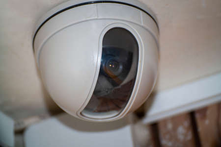 Security camera on the light ceiling in office