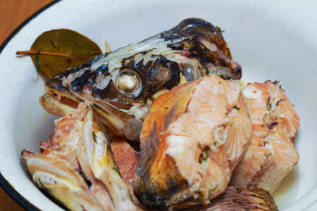 Pieces of boiled fish pike in a plate that look natural
