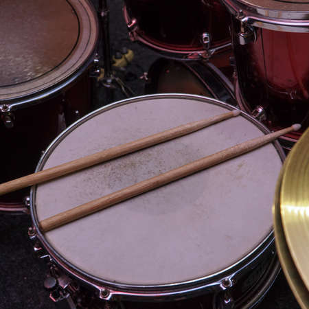 Drum sticks on the old snare drumの写真素材