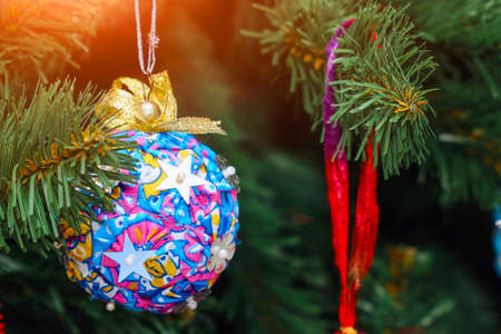 Christmas balls on the Christmas tree branch. Magic lights. Selective focusの写真素材