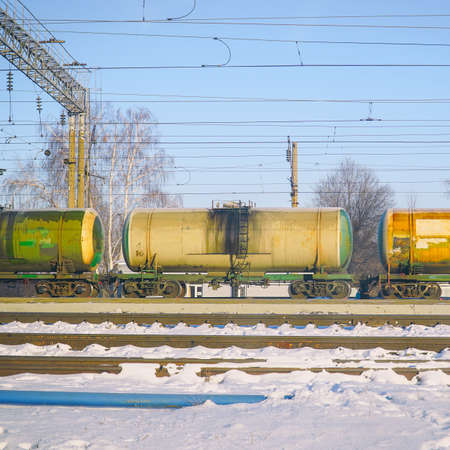 Railway tanks at the station against the blue skyの写真素材
