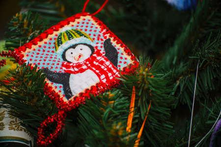 Embroidered snowman on the Christmas treeの写真素材