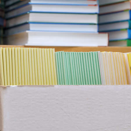 Books and brochures on a shelf in the libraryの写真素材