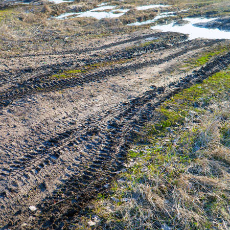 Spring landscape. Dirty spring road. Impassability and mudslides.の写真素材