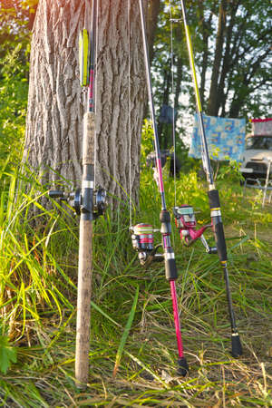 Spinning rods with reels and lures ready for fishing