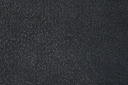 The texture of the black plastic ribbed surface for backgroundの写真素材