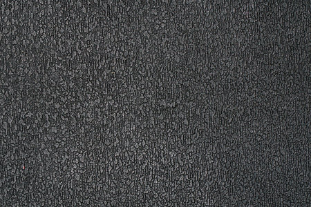 The texture of the black plastic ribbed surface for backgroundの写真素材