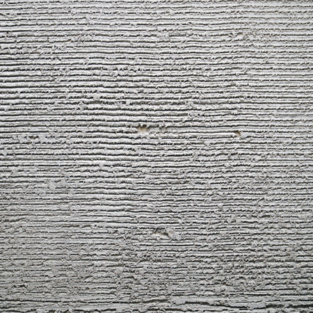 Gray decorative plaster on the wall with pressed horizontal stripes. Plaster backgroundの写真素材
