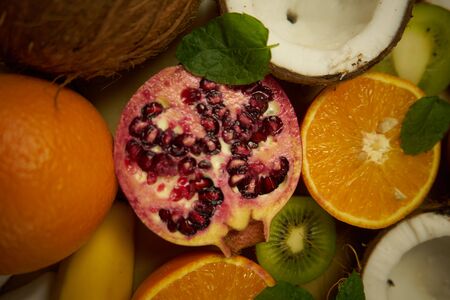 Fruit in preparation for a delicious fruit salad. Close-up of fruit structure and beautiful colors.の写真素材