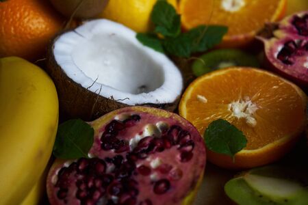 Fruit in preparation for a delicious fruit salad. Close-up of fruit structure and beautiful colors.の写真素材