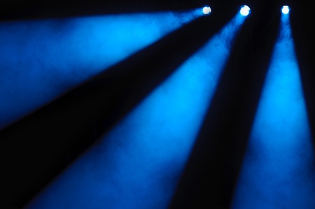 Abstract dark background with bright blue stage spotlightsの写真素材