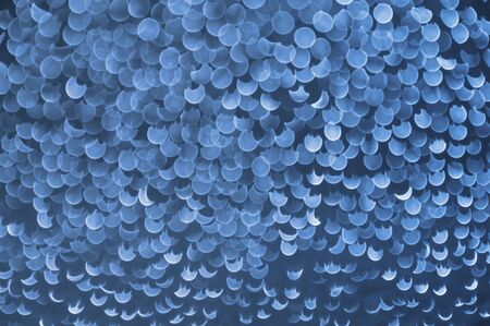 Blue toned background image with round circles forming patternsの写真素材