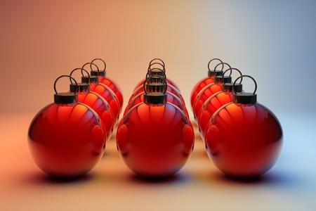 Twelve shiny red Christmas baubles in even rowsの写真素材