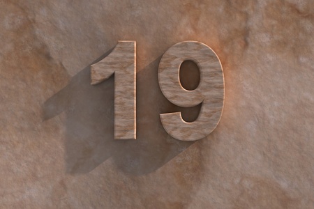 Number 19 embossed or carved from marble placed on a matching marble base