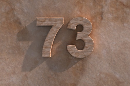 3d rendered illustration of an ornamental 73 in numerals in mottled sandstone on a rough textured wall with shadowの写真素材