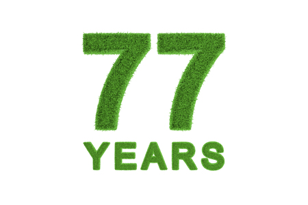 Decorative eco-friendly three-dimensional green grass numbers and text for a 77th anniversary or...