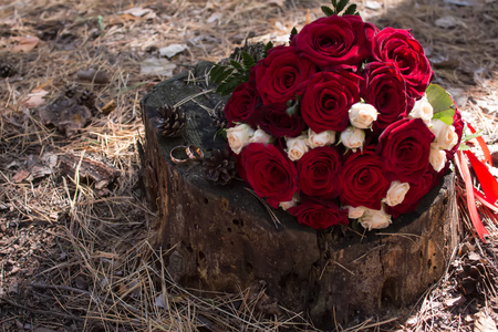 wedding bouquet of flowers lying on a bench, on a blurred background flower, bouquet, loveの写真素材