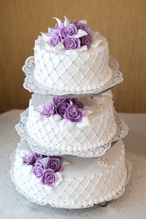 Wedding cake decorated with flowers and berries beautiful, decorationの写真素材