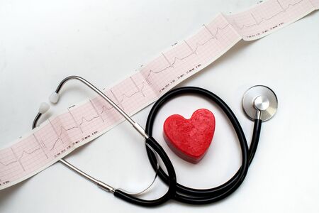 Red heart and a stethoscope on desk cardiac, closeupの写真素材