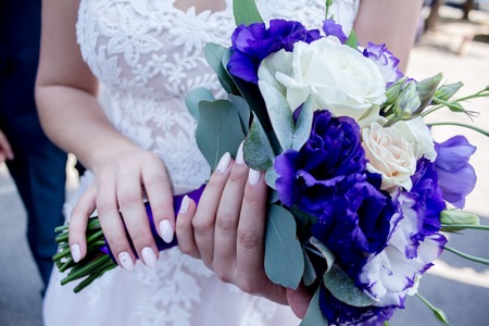 Woman holding bouquetの写真素材