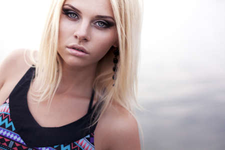 portrait of a girl on the lakeの写真素材