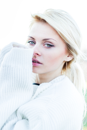 Beautiful girl portrait outdoor in sunny weatherの写真素材