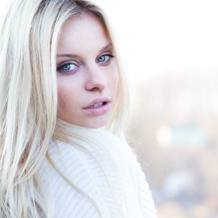 Beautiful girl portrait outdoor in sunny weatherの写真素材