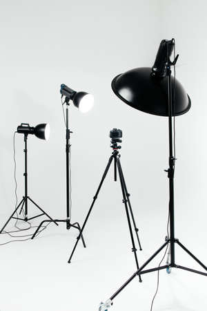 Camera with lighting equipment in studioの写真素材