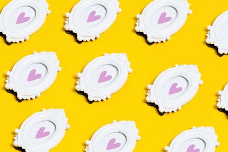 Colorful heart abstract pattern on yellow background. Grunge ornament texture. Wallpaper background. Geometric template.の写真素材