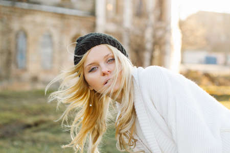 Girl in sweater close-up portrait outdoor. warm fall.の写真素材