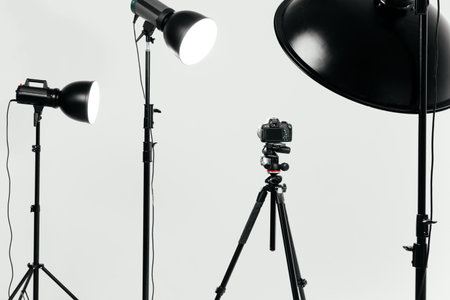 Camera with lighting equipment in studioの写真素材