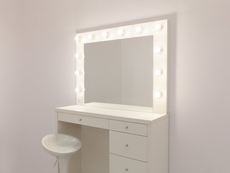 Makeup mirror with gold lights. Photo of the mirror in the make-up room. Backstage dressing roomの写真素材