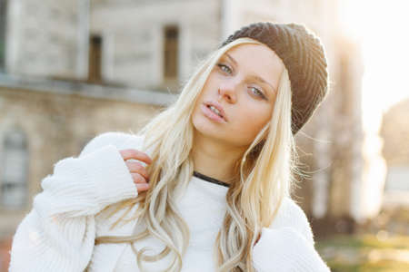 Outdoor portrait of young sensual woman in the hood closeup.の写真素材