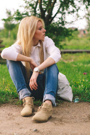 Outdoor portrait of young sensual woman in the hood closeup.の写真素材