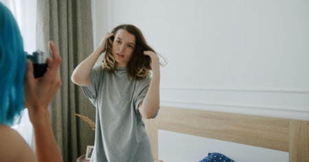 Exploring a Captivating SelfPortrait Session Held in a Stylish Modern Bedroom Environmentの写真素材