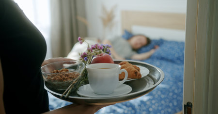 Savor the Delight of Breakfast in Bed for a Cozy and Inviting Morning Experienceの写真素材