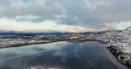 Winter Glow on Norways Frozen Lakescape