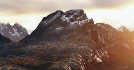 Sunset Embrace: The Lofoten Giants Golden Hour
