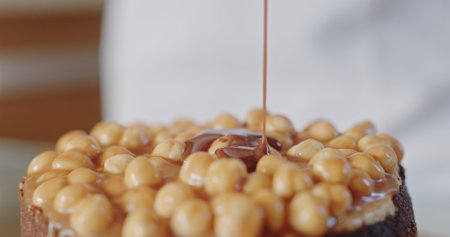 Decadent Nut Topped Cake Drizzled with Rich Caramel