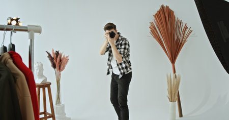A Creative Photoshoot in a Studio Setting Featuring Unique Ambiance and Artistic Design Elements