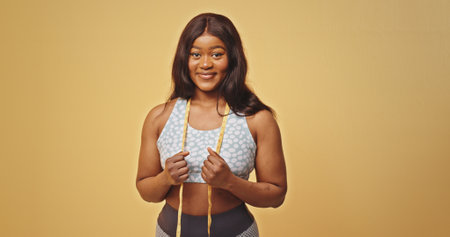An empowered woman is ready and excited to work out in stylish fitness apparel she loves
